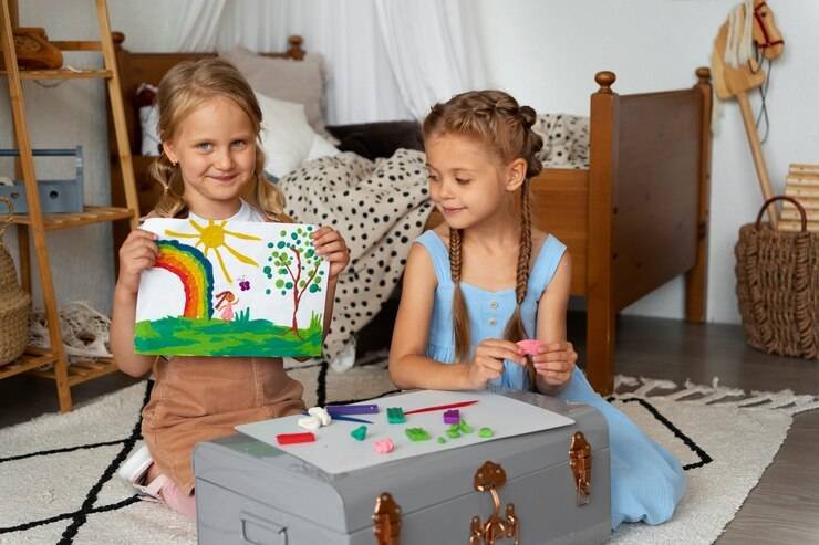 kids-playing-with-play-dough_23-2149572135